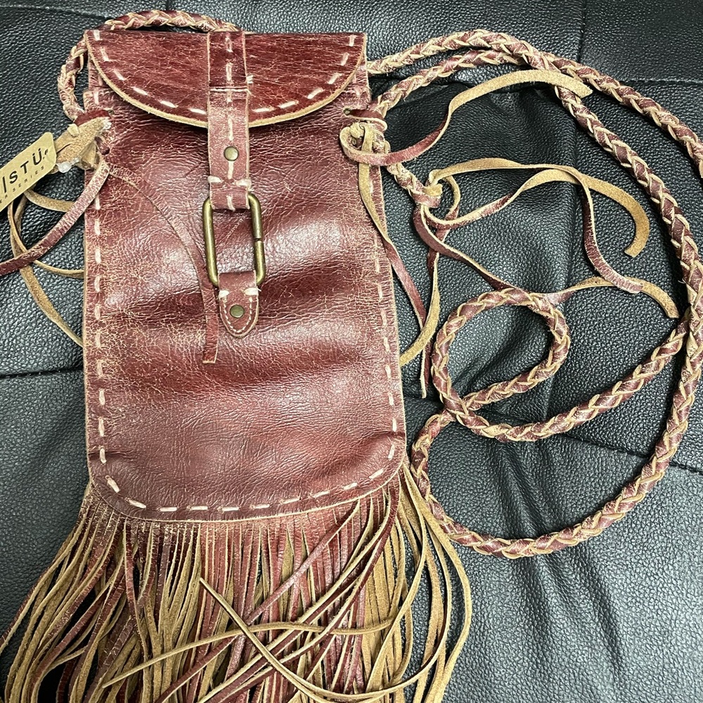 Leather purse with fringe  and it’s new with tags